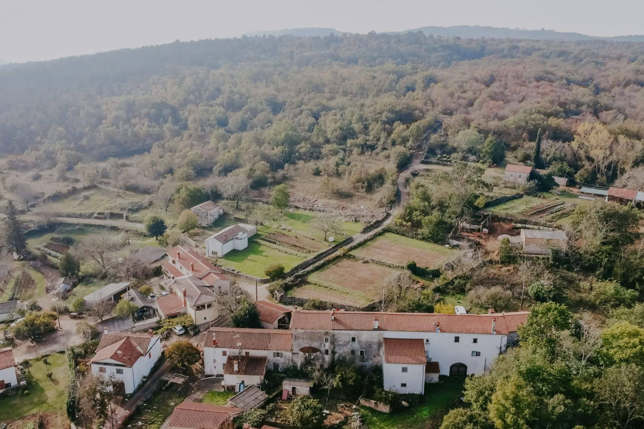 sterna surroundings a complex of stone houses in a row with building land sterna surroundings a complex of stone houses in a row with building land