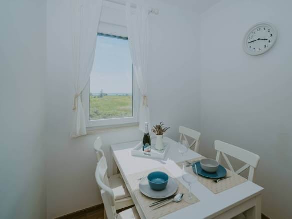 karigador ekskluzivan prekrasan namješten stan prvi red do mora