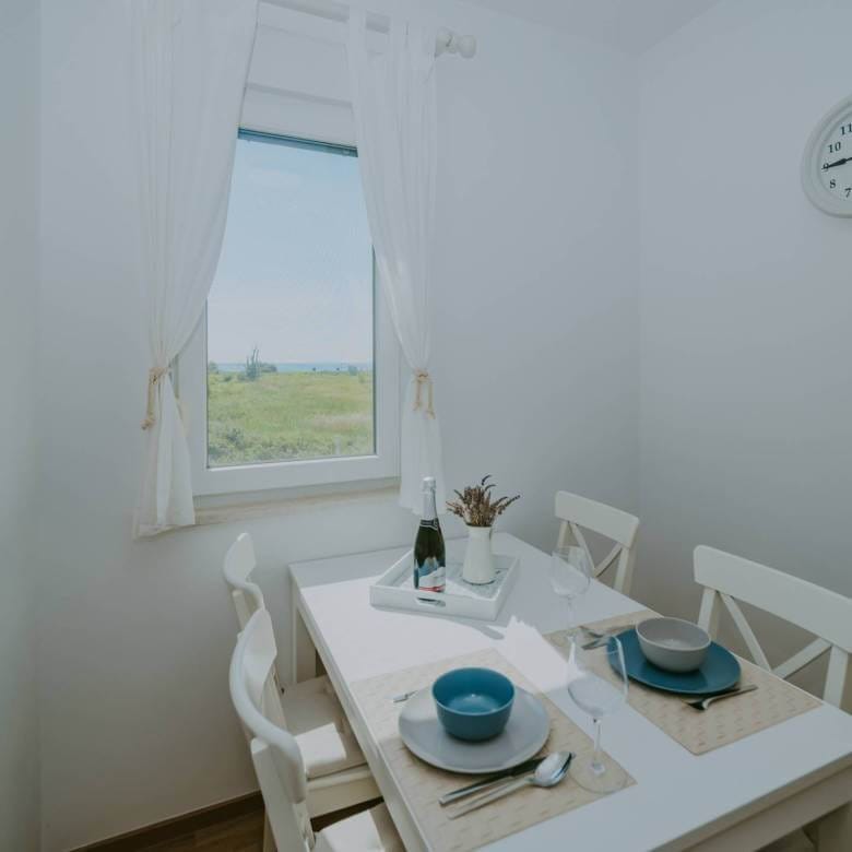 karigador ekskluzivan prekrasan namješten stan prvi red do mora